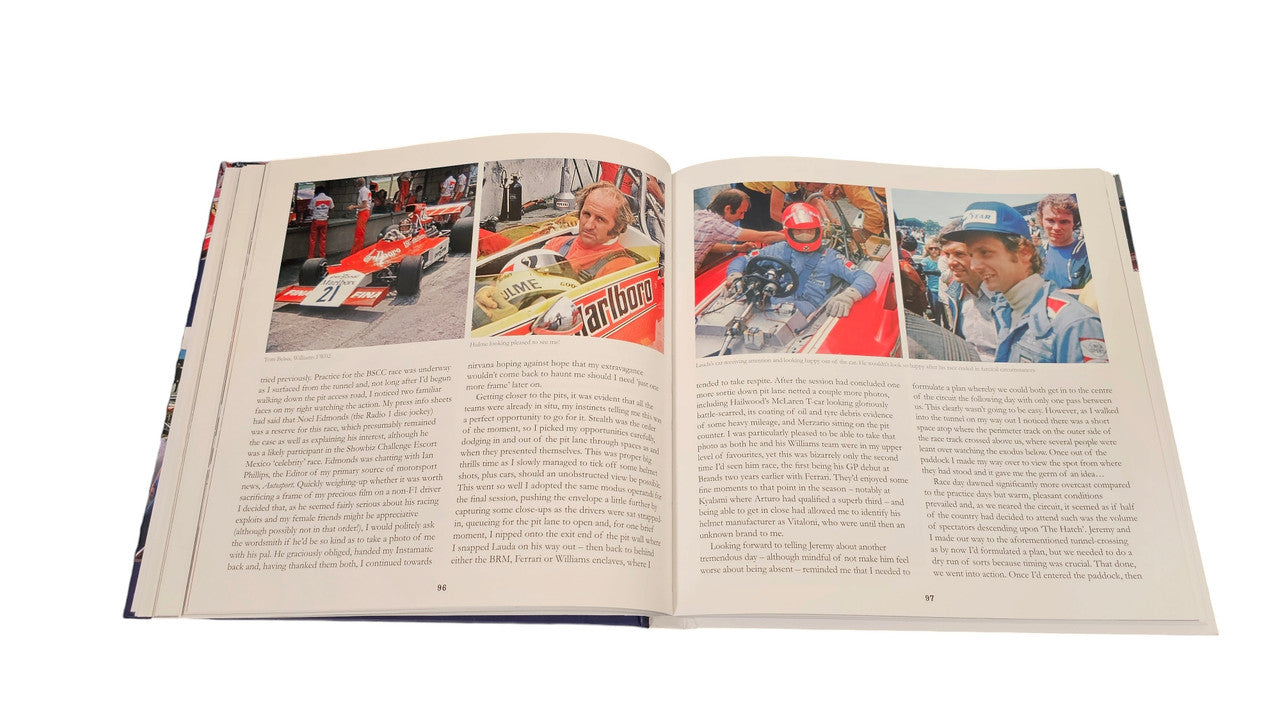 Signed racing history book open to a spread with portraits and race photos