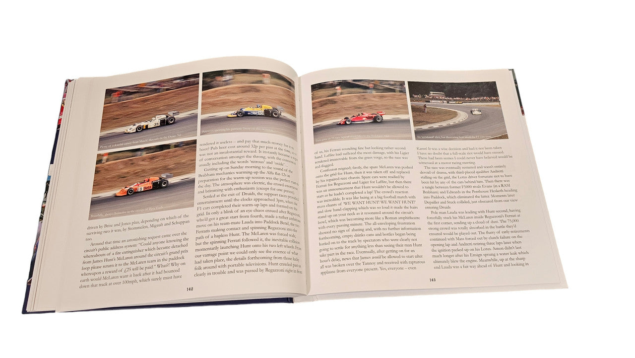 Open hardcover book with racing photos on both pages
