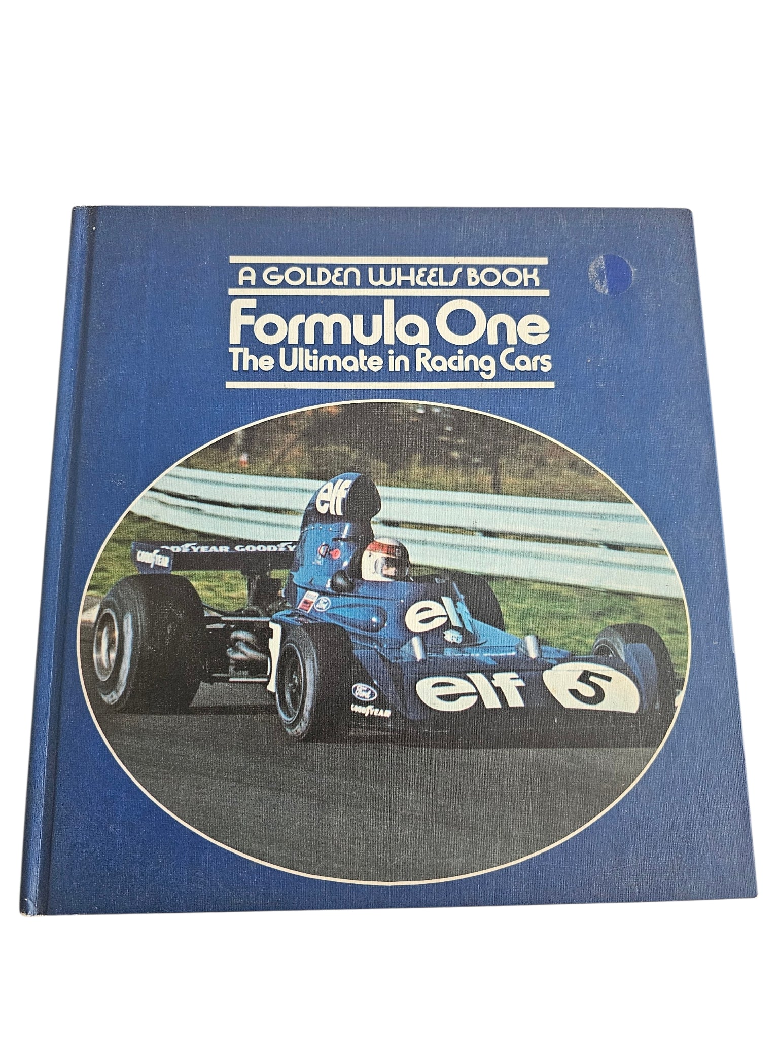 Book titled 'Formula One: The Ultimate in Racing Cars' by Golden Wheels 