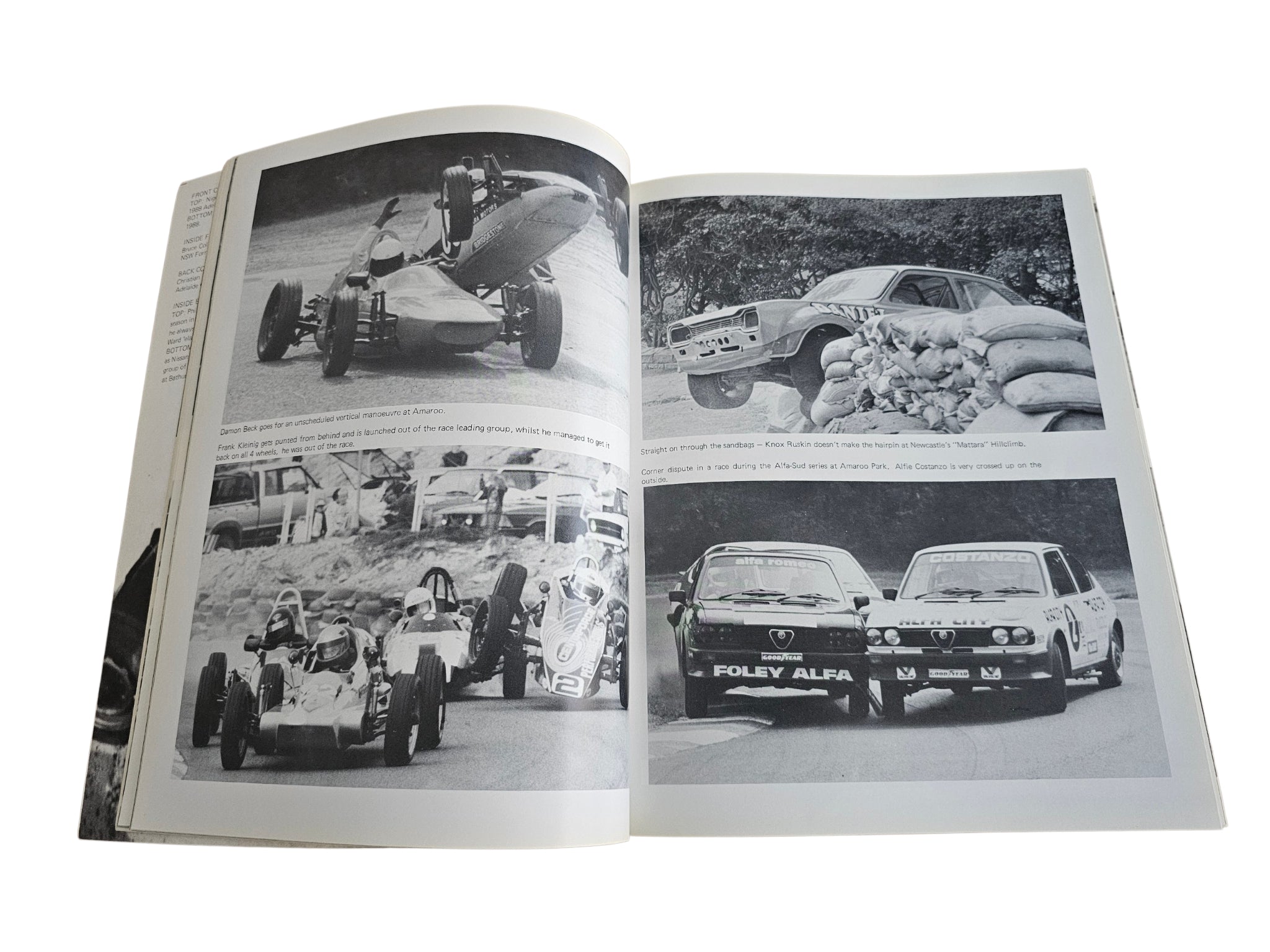 Motorsport action book spread with black-and-white racing scenes and cars in motion