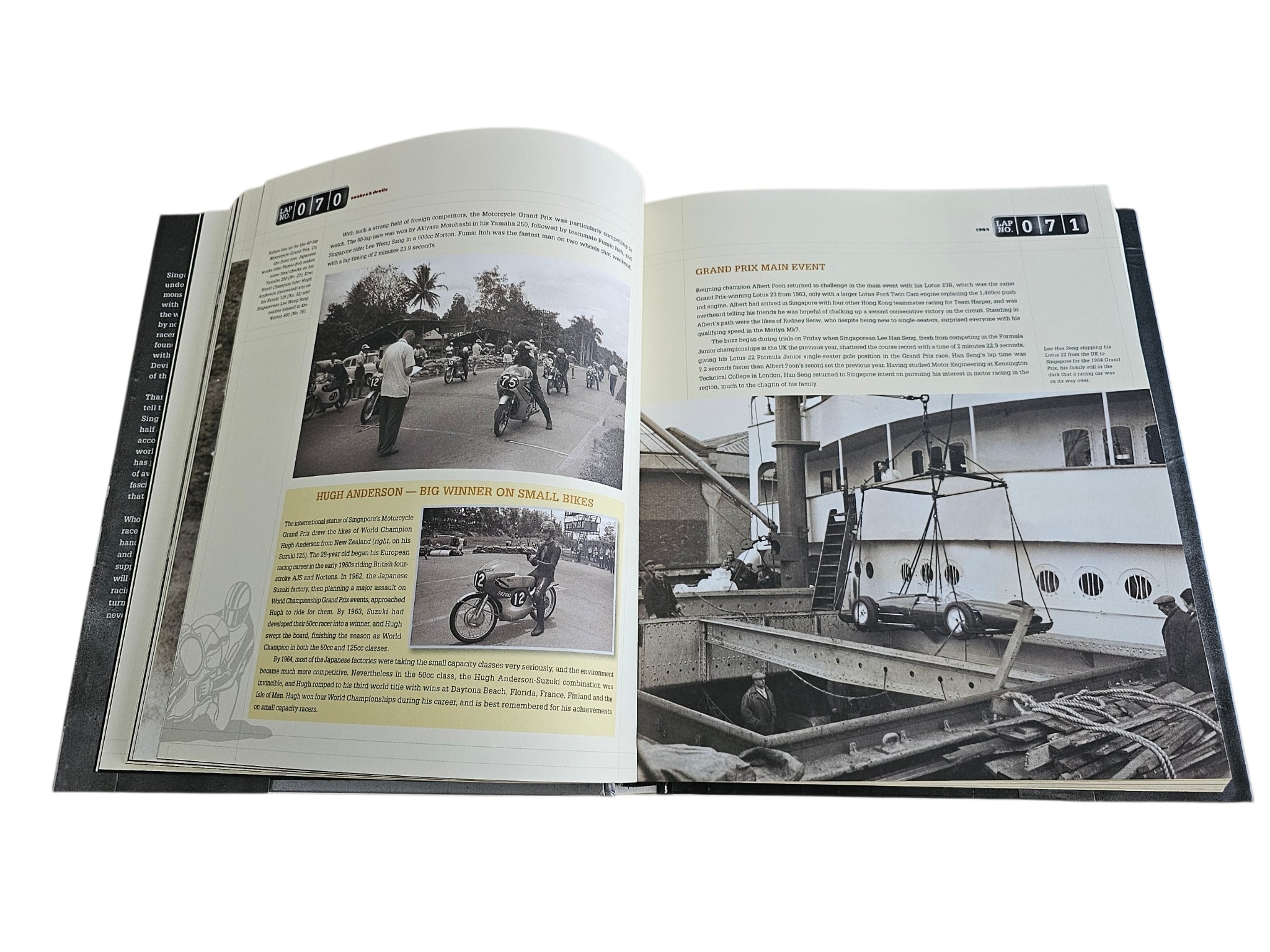 Signed motorsport history book, open spread with two motorcycles and vintage aircraft photo
