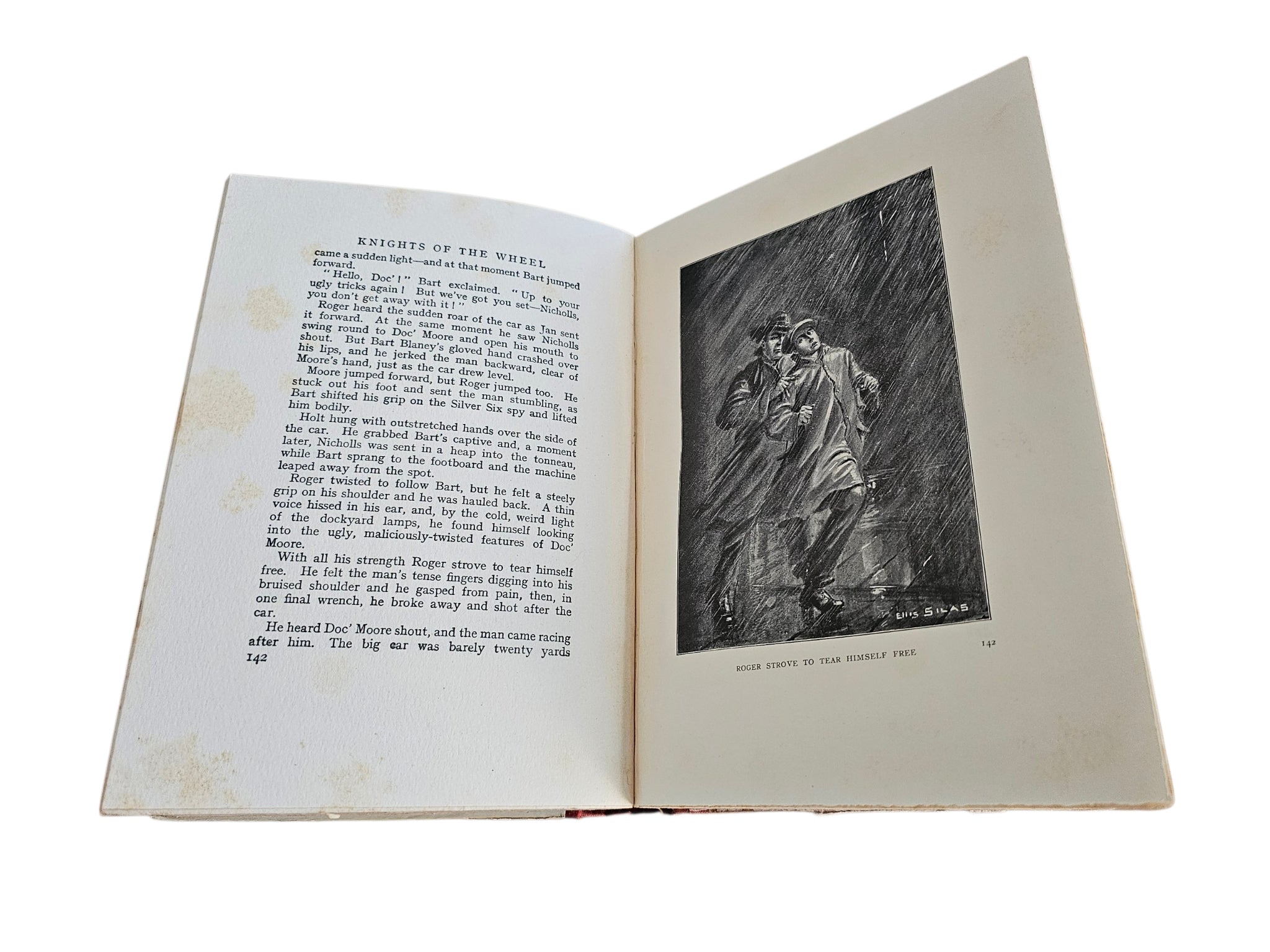 Knights of the Wheel book open to text with black-and-white portrait illustration