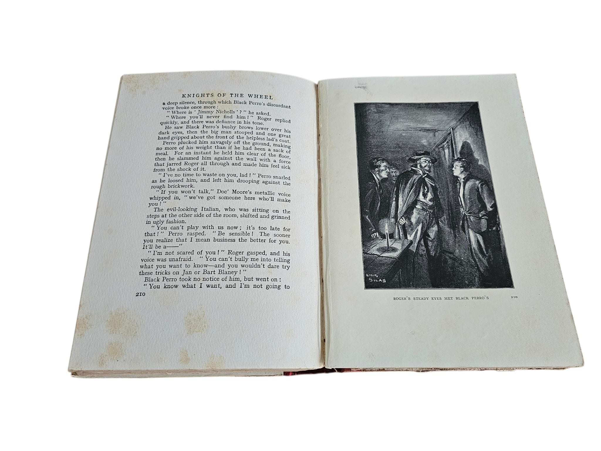 Knights of the Wheel book open to story text with framed black-and-white scene