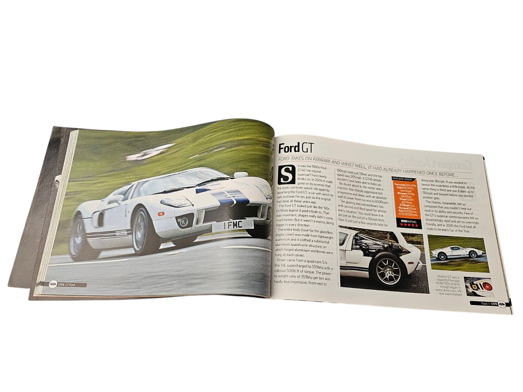 Supercar guide book open spread featuring a white race car and Ford GT page