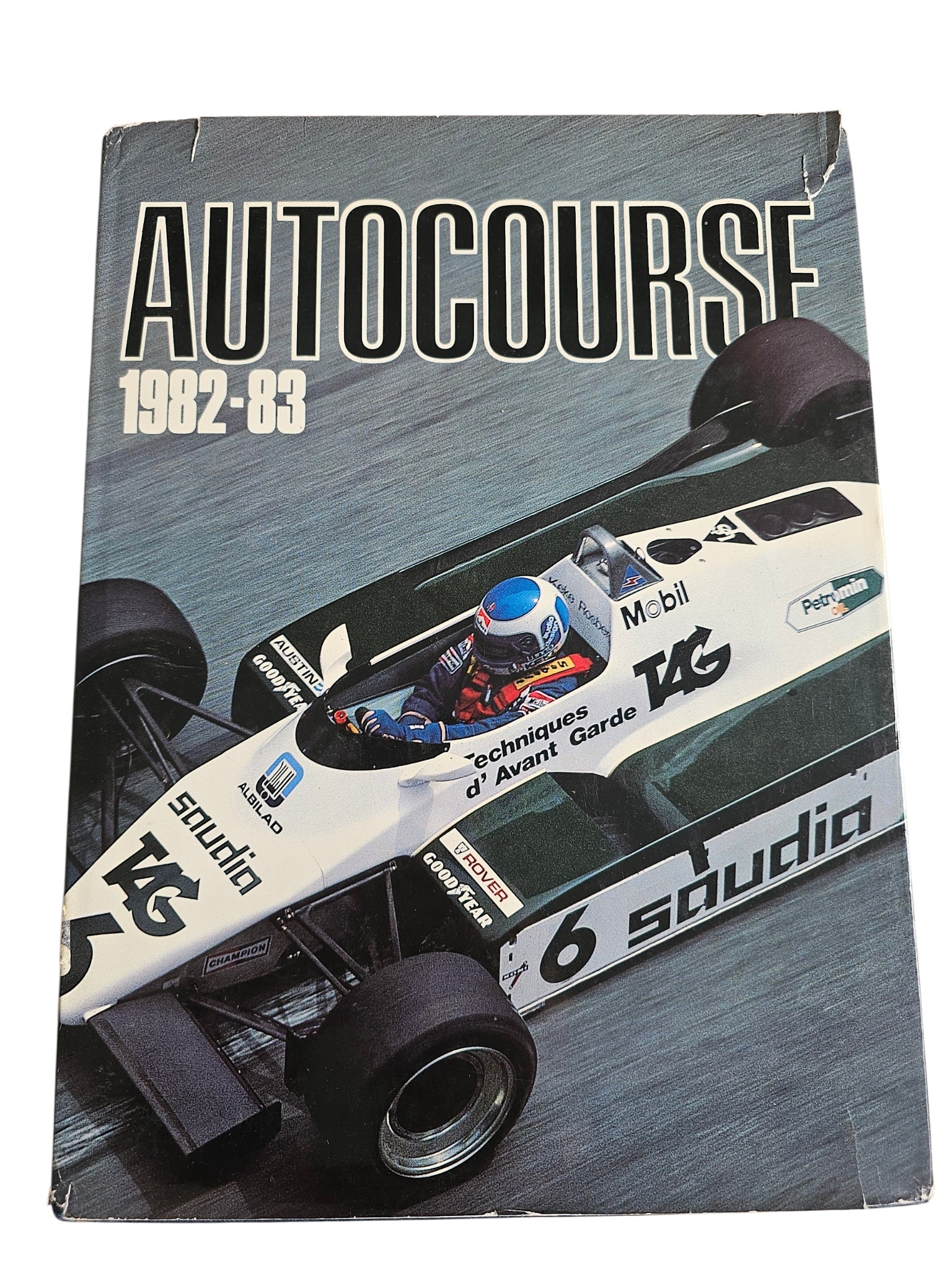 Autocourse 1982–83 racing book cover with bold Autocourse title and car image