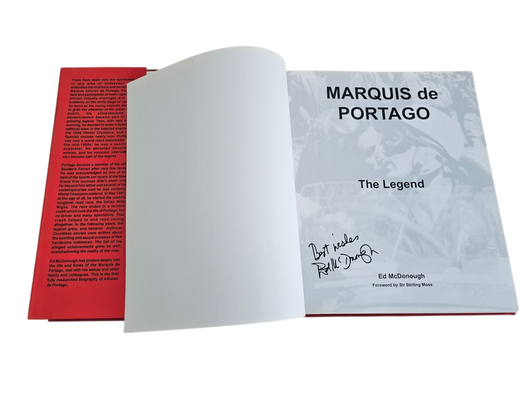 Open book with white pages and gray cover showing MARQUIS de PORTAGO "The Legend"
