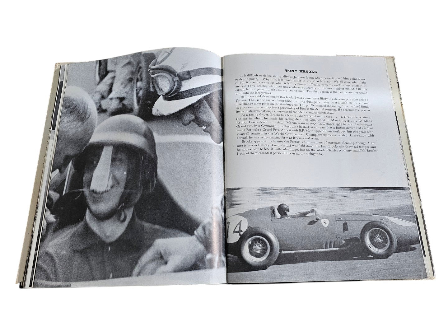 Open vintage auto racing book with black-and-white photos of drivers and cars