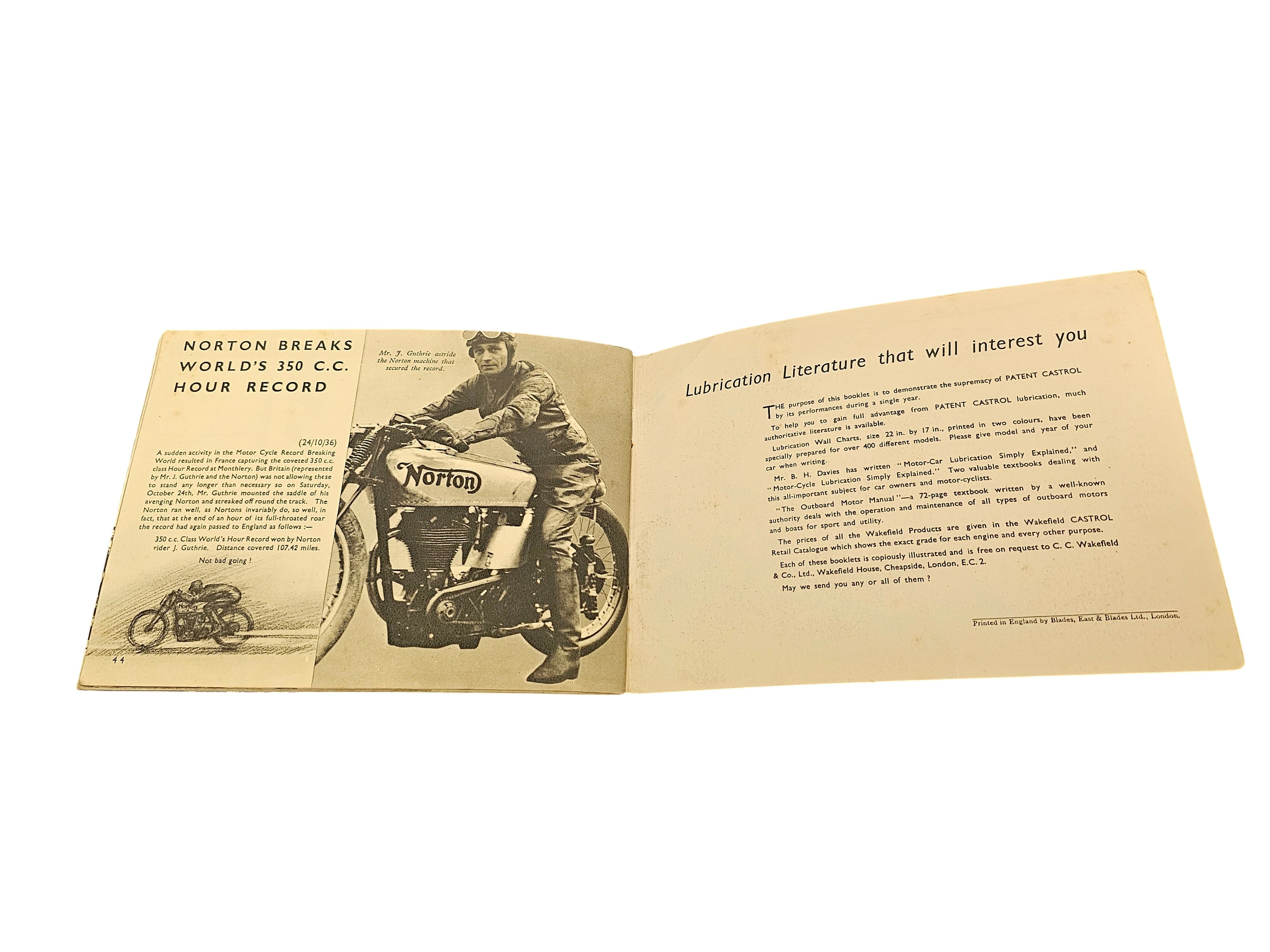 Open vintage booklet pages with rider on motorcycle and diagram