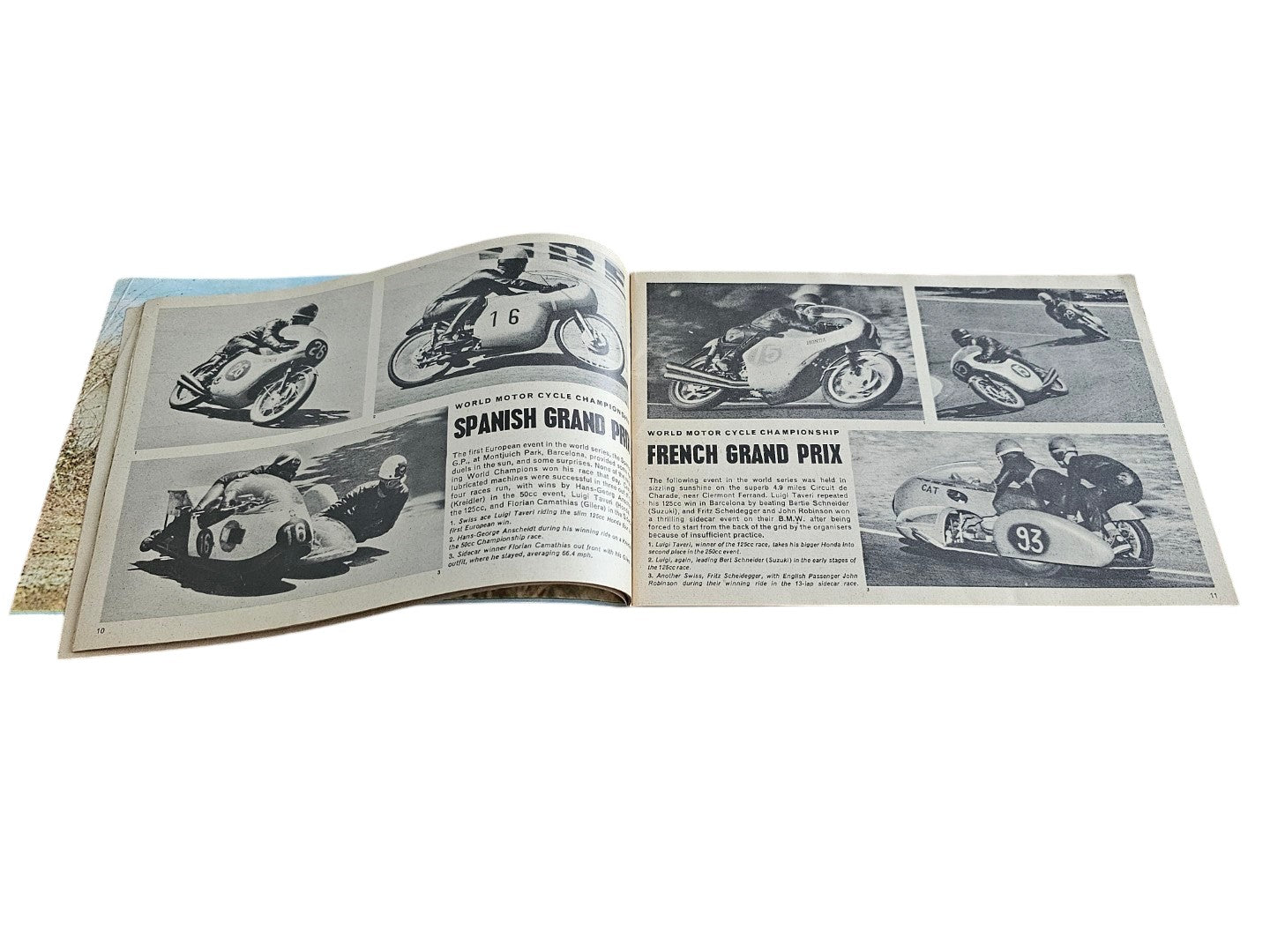 Open vintage booklet pages with grayscale race motorcycles and car racing captions