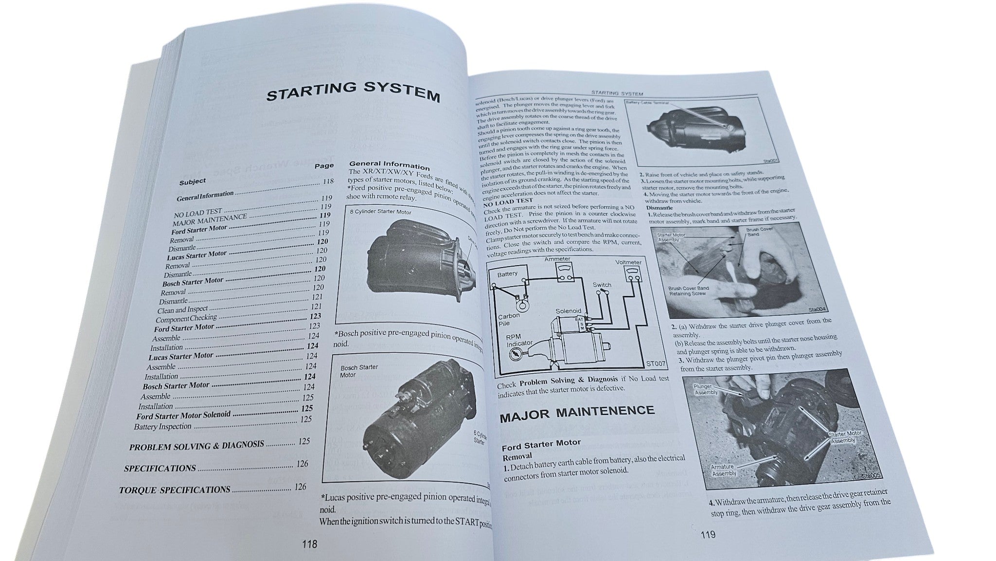 Workshop manual open page on starting system with diagrams and photos