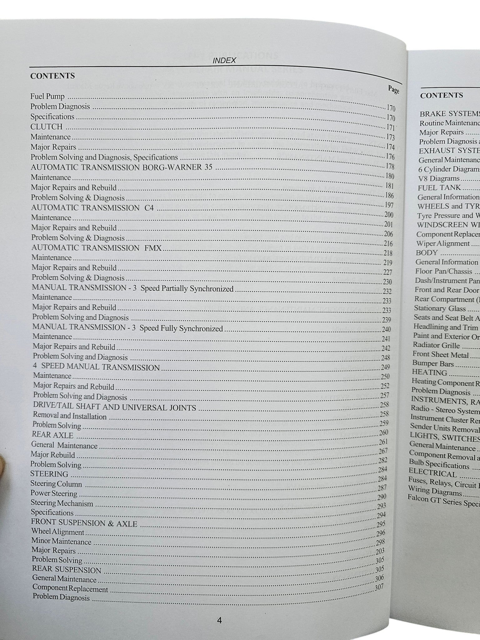 Workshop manual open contents page with system lists and page numbers