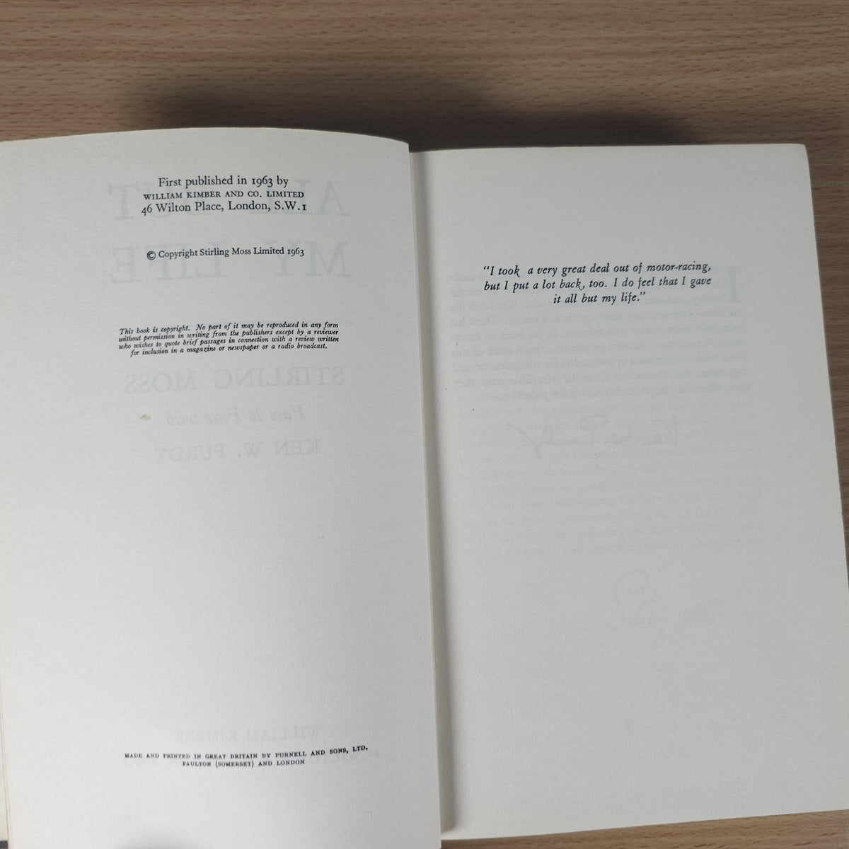 Open book with cream pages showing printed text on the left and right page