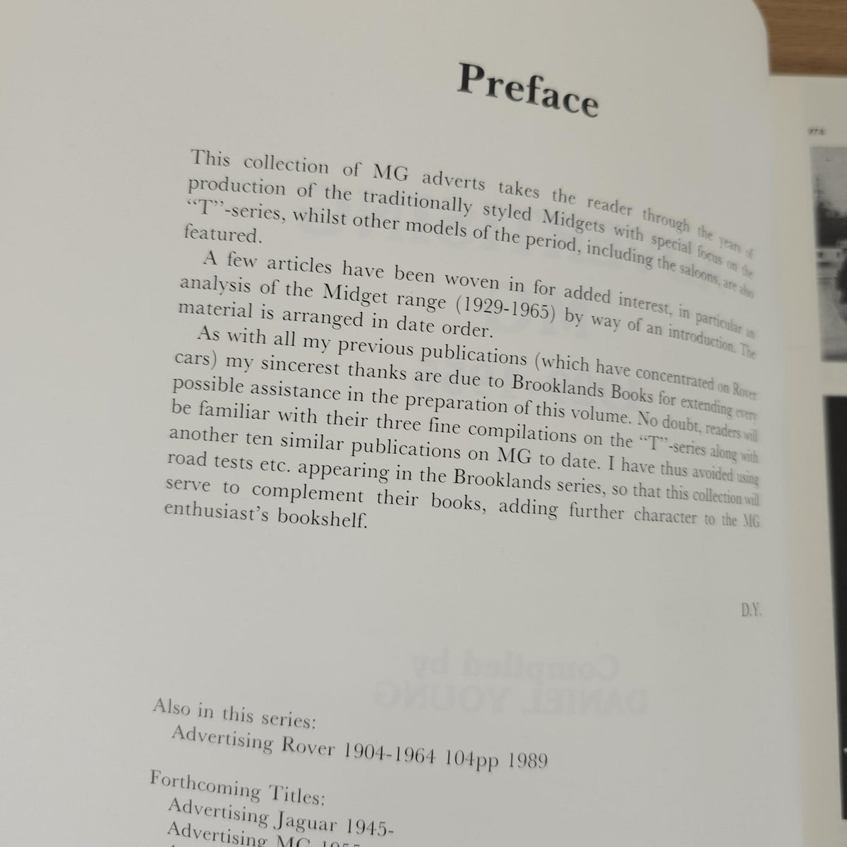 Vintage MG advertising book open to “Preface” text on the left page.