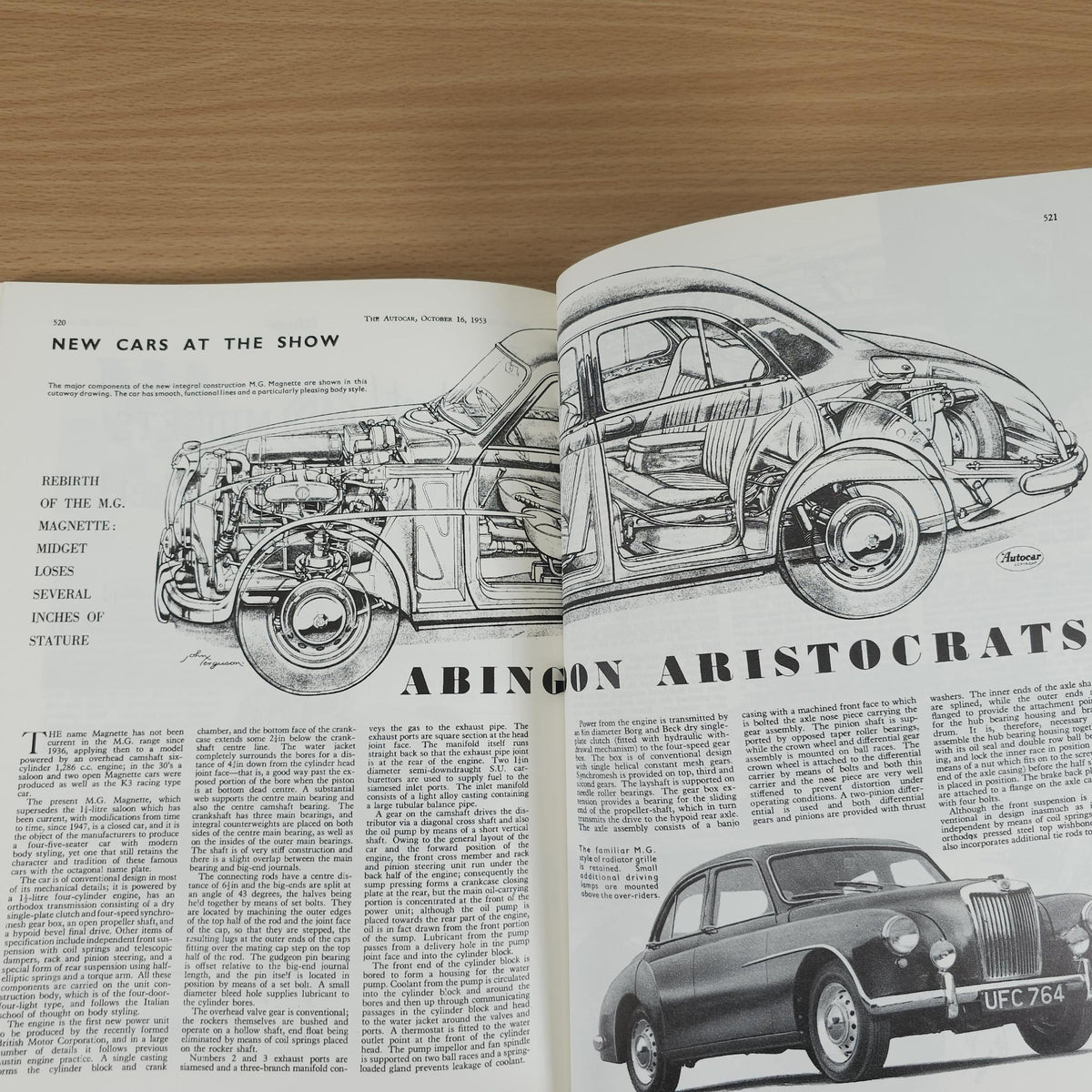 Vintage MG advertising book, open spread with car illustration and “Abingdon Aristocrats” heading