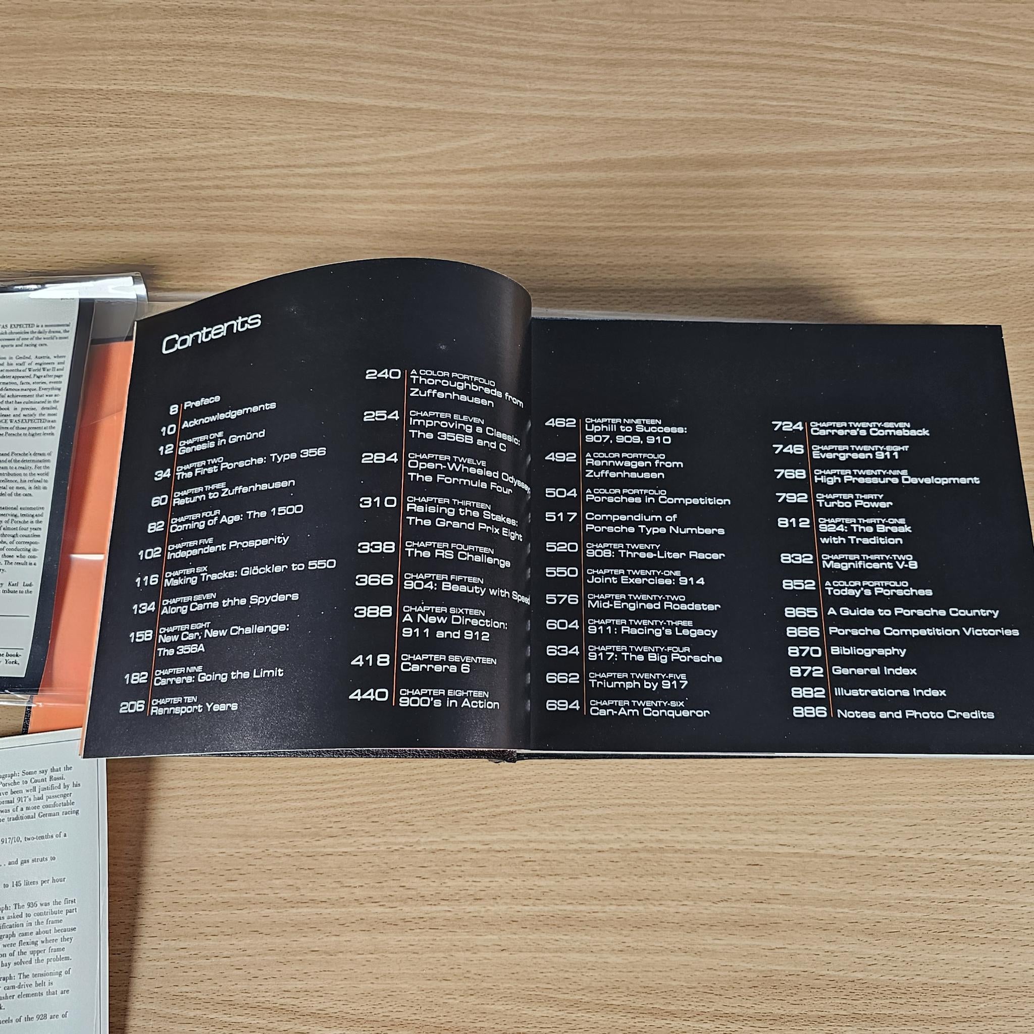 Automobile history book open to "Contents" index pages on a dark layout