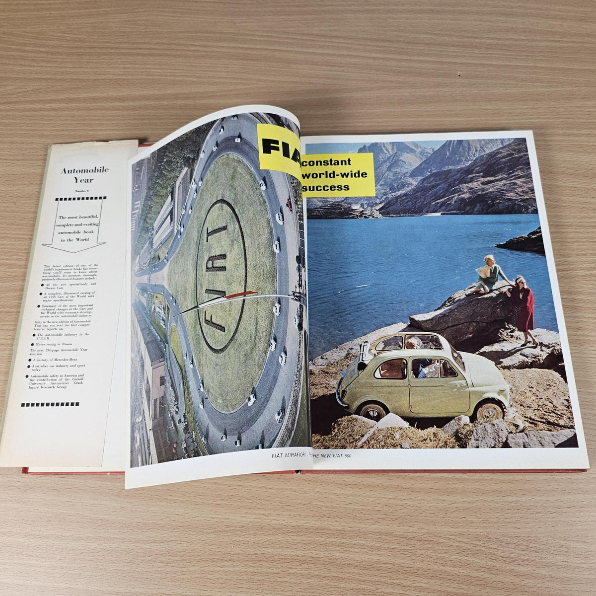 Automobile Year 1958-1959 booklet open with car photo and engine diagram spread