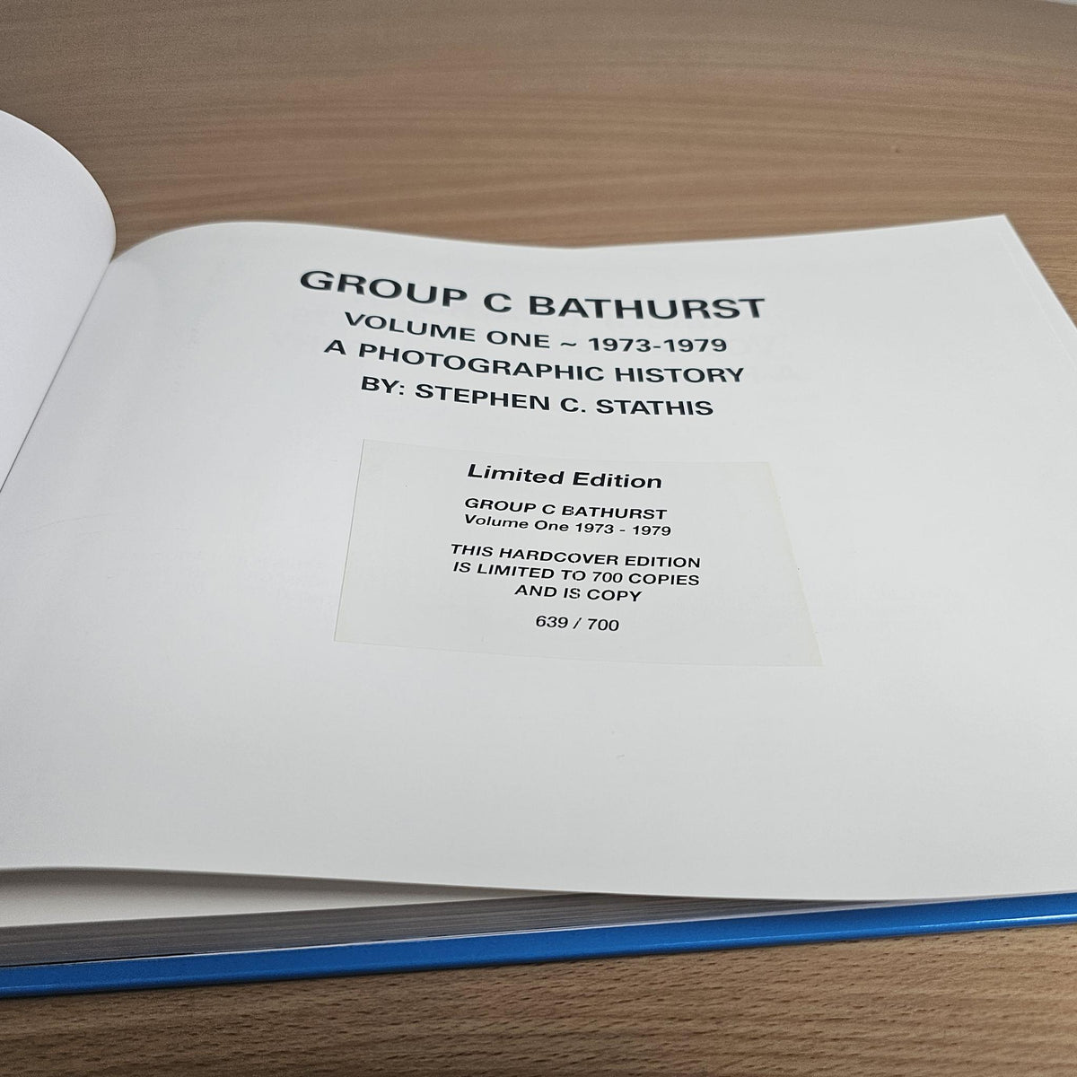 Open book page showing Group C Bathurst title and edition information box