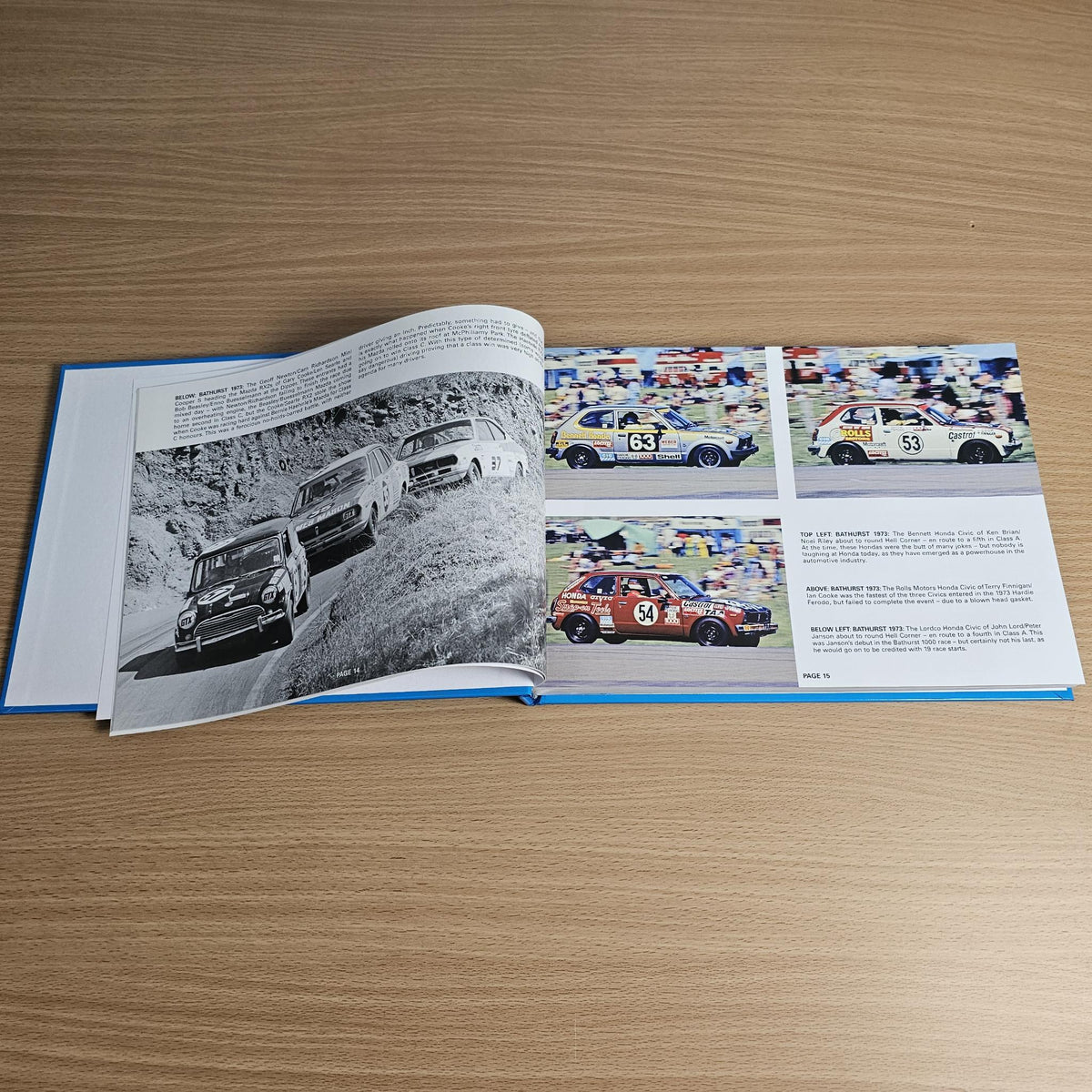 Open book pages with black-and-white car image, color race photos, and captions