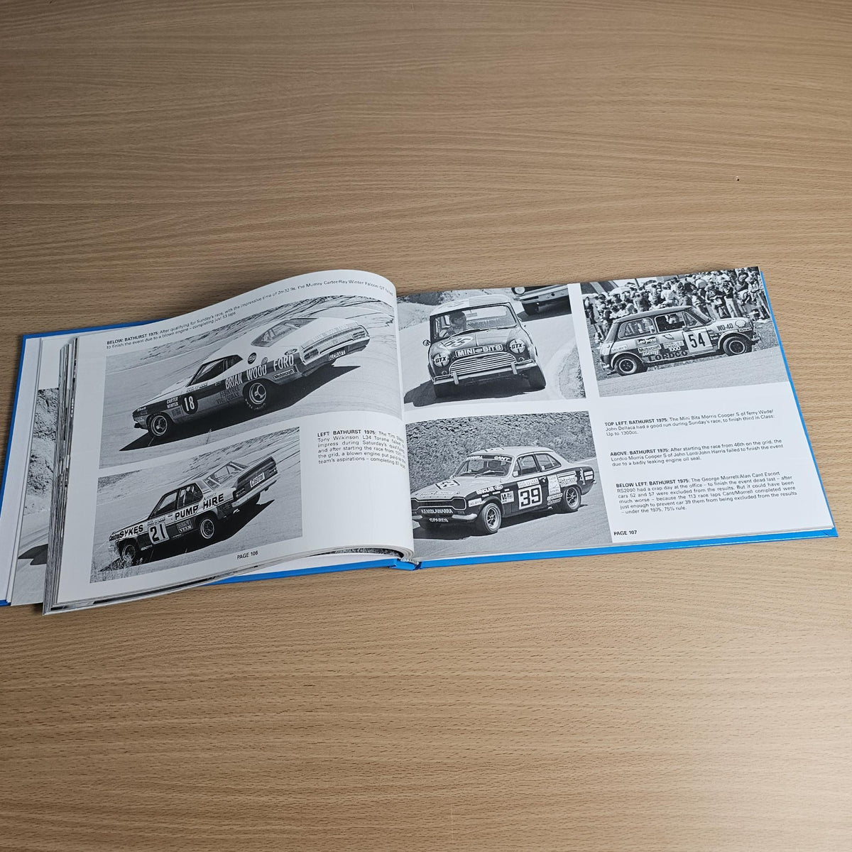 Open book spread with black-and-white race car photos and color image panel