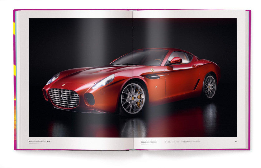 Open automotive book featuring a red sports car on glossy dark page