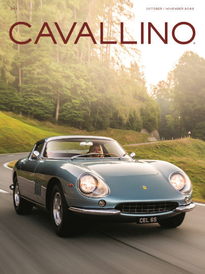 Motoring magazine cover with Cavallino logo and classic gray sports car on road