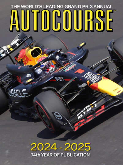Motorsport annual magazine cover with blue and red race car front view