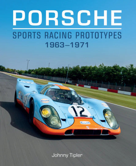 Blue Porsche race car with number 12 on a racetrack