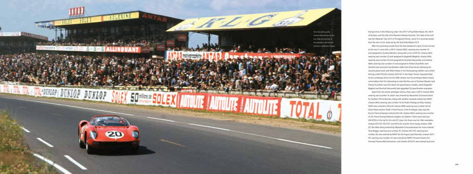 Vintage race car driving down a track with crowd stands and banners behind