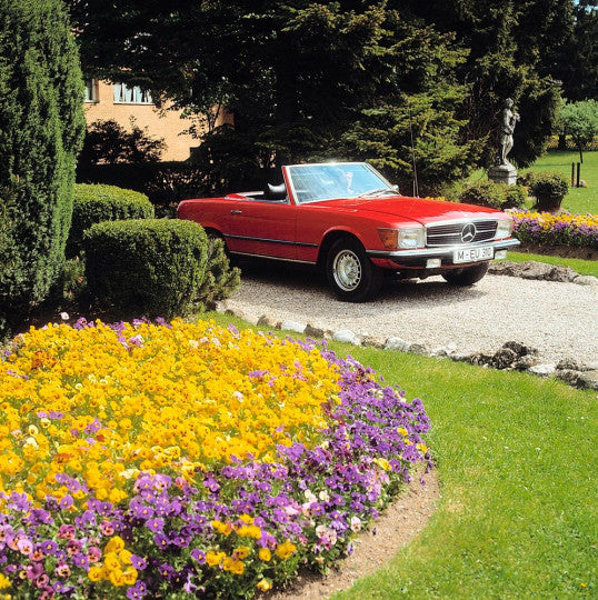 Mercedes-Benz SL & SLC book page showing a red vintage convertible on a drive