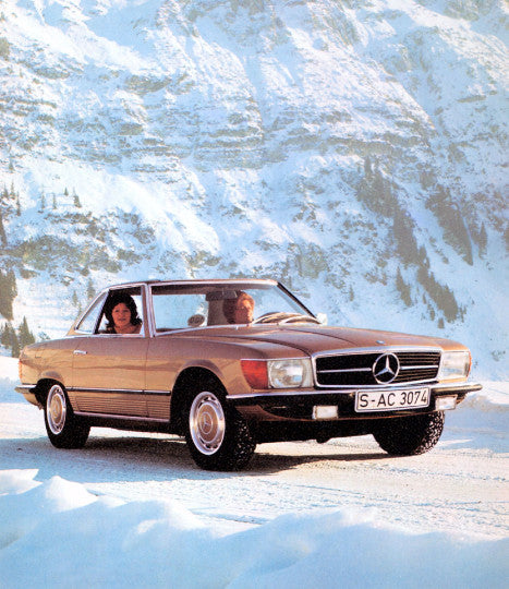 Mercedes-Benz SL & SLC book page showing a tan convertible on a snowy mountain road