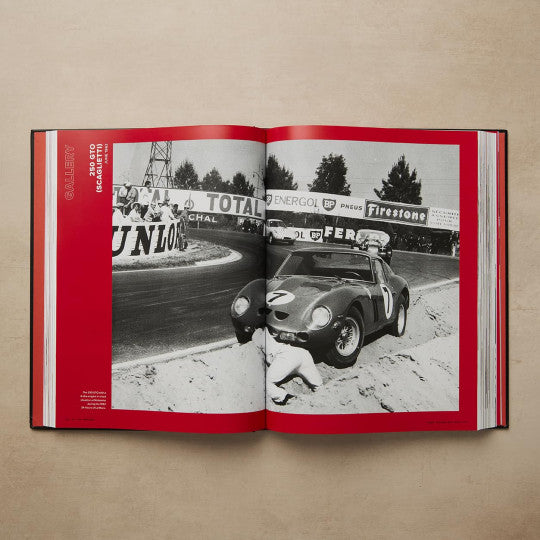 Open car book spread with black-and-white race car photo and red header borders