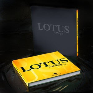 Lotus The Marque book with yellow cover and dark slipcase, standing spine