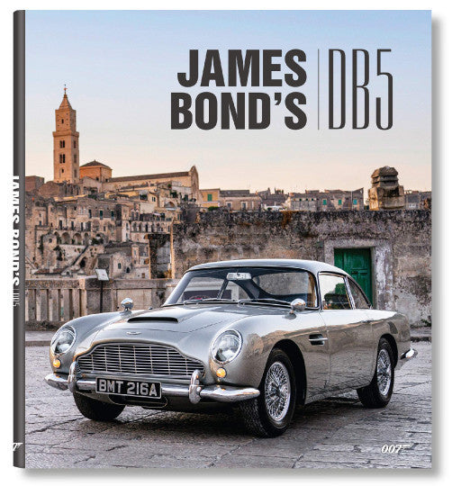 James Bond's DB5 book cover with silver vintage car and city scene
