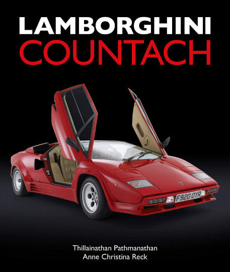 Red Lamborghini Countach model car with scissor doors open, front three-quarter view