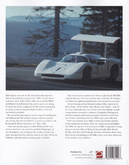 Motorsport book cover photo of a white race car with number markings on track