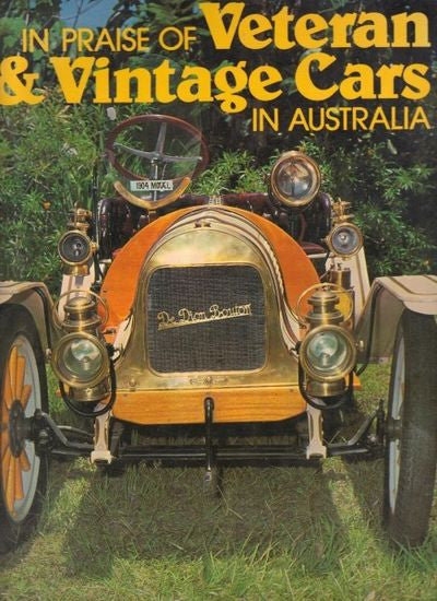 Vintage car book cover showing front of orange brass car with headlamps and badge