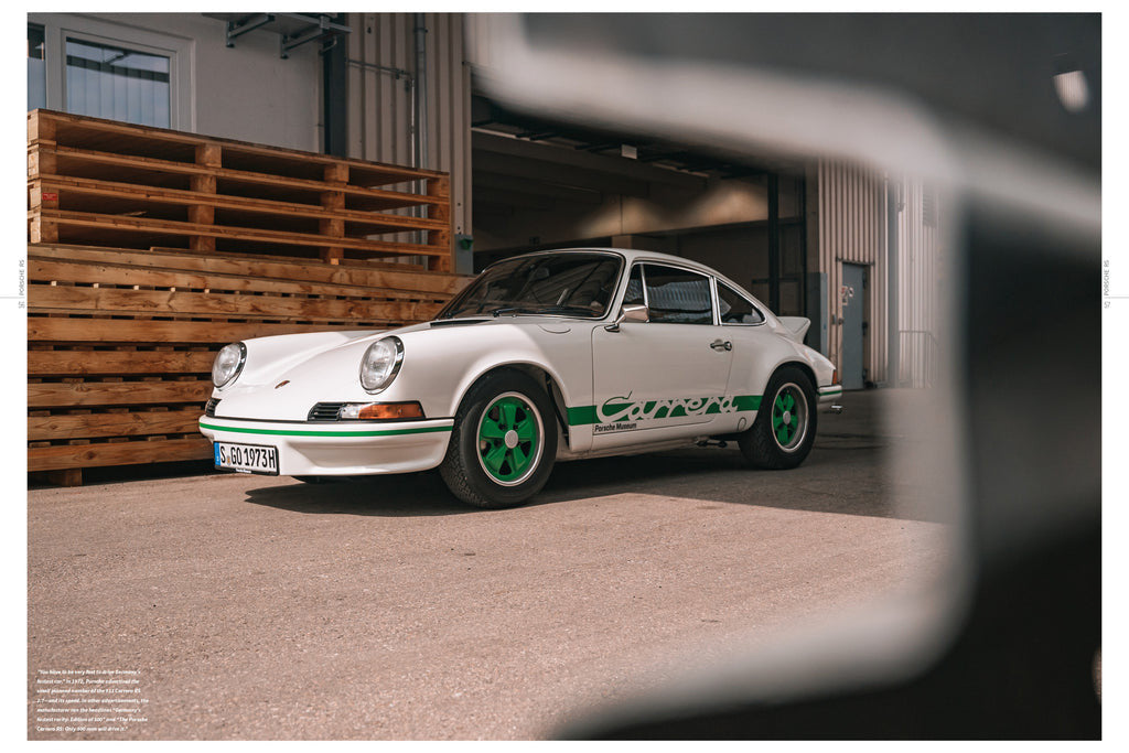 White sports car with green rims on book page