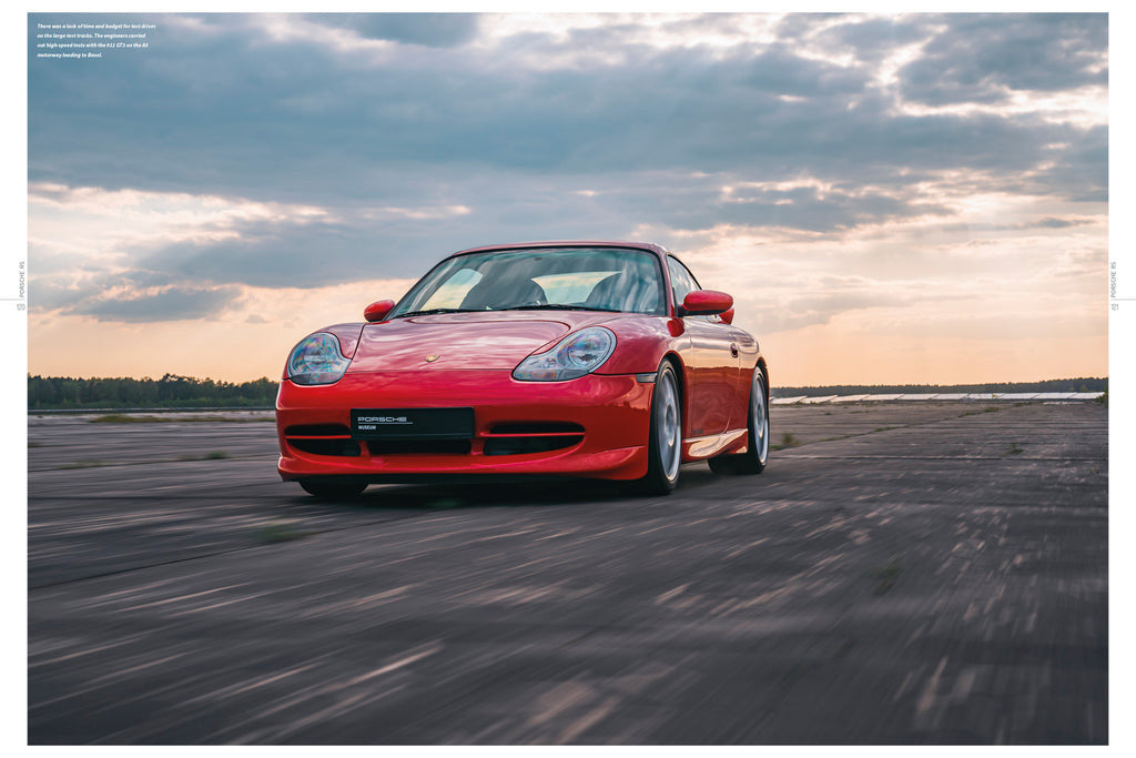 Red sports car front view on book page