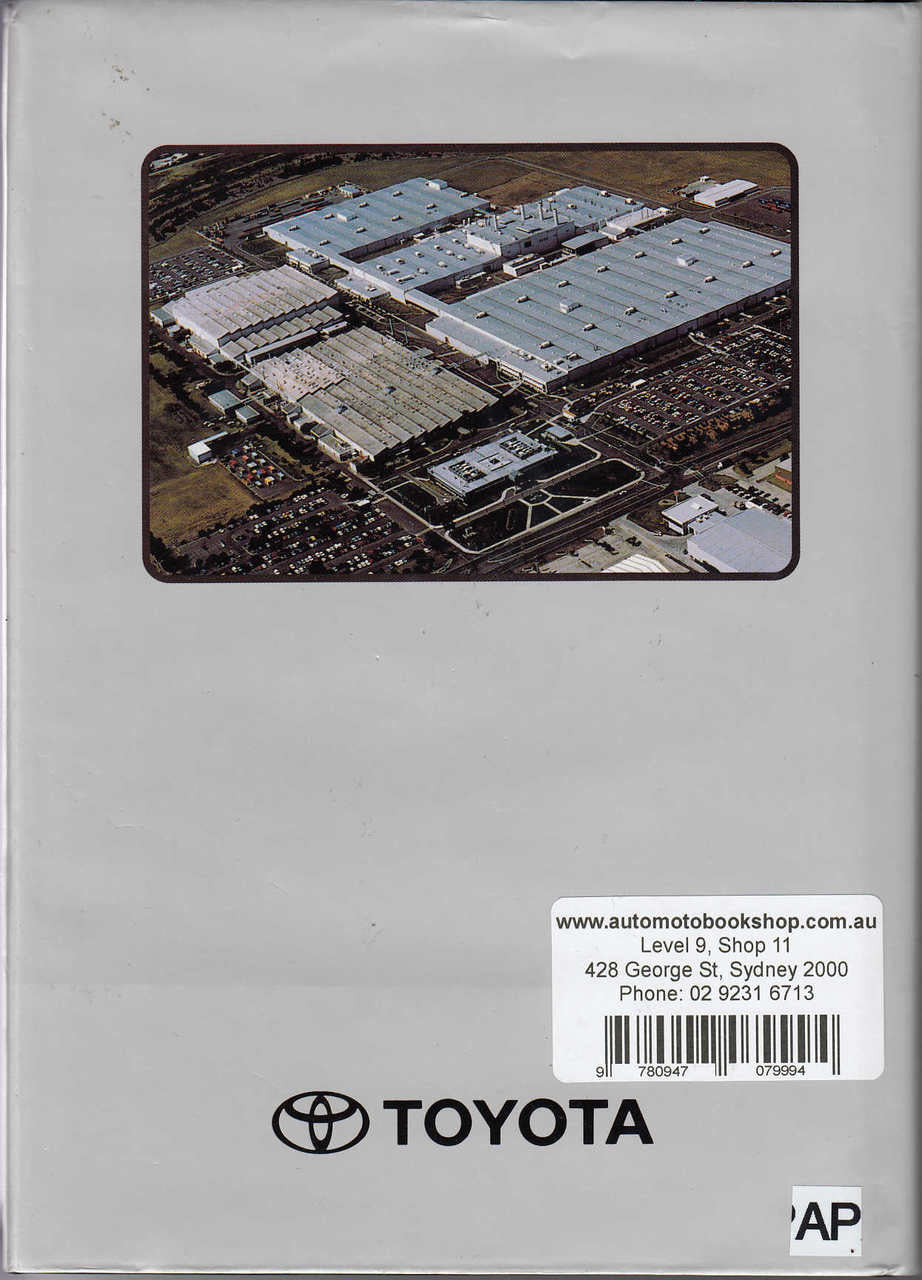 Automobile history book back cover with facility aerial photo and Toyota logo