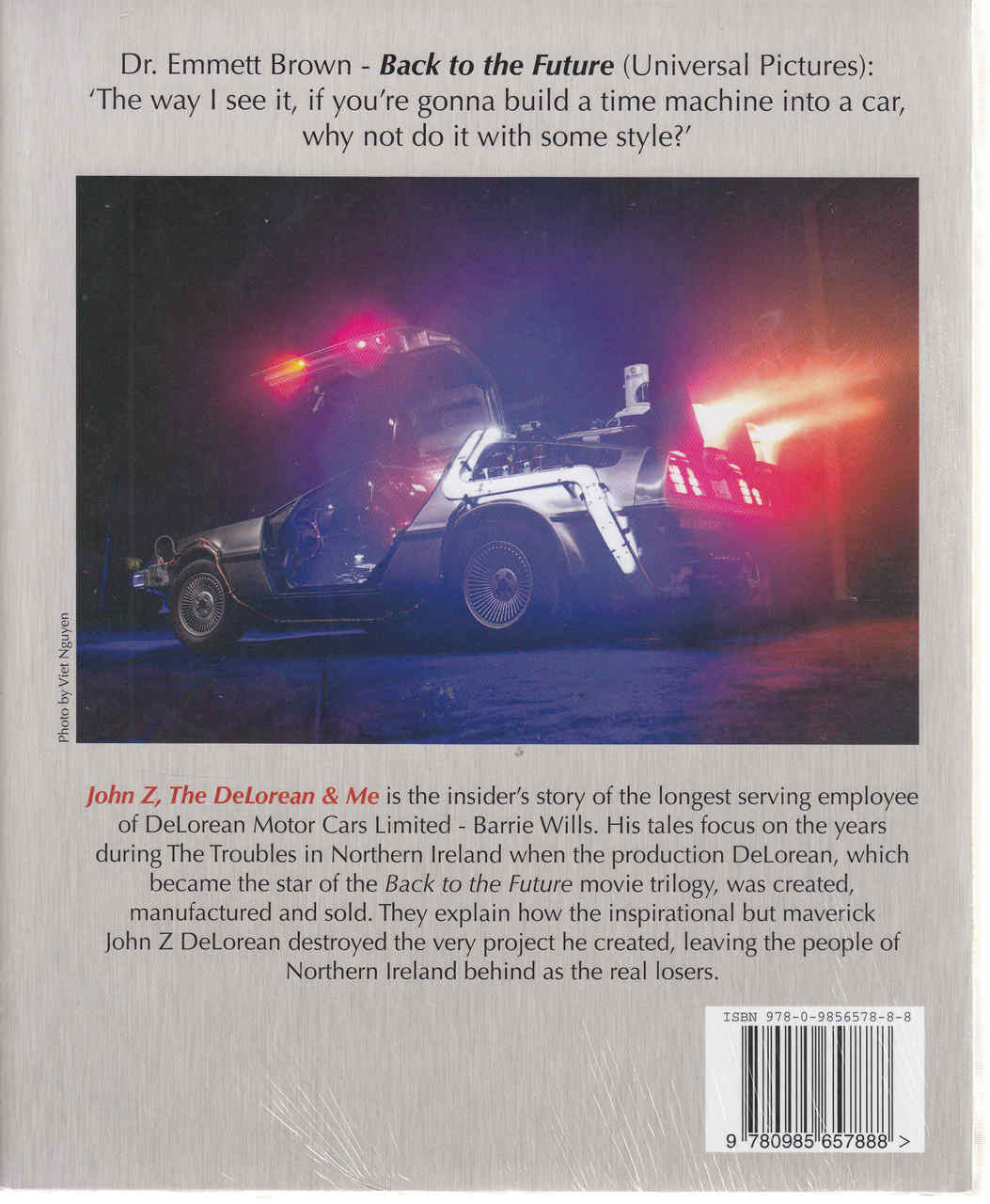 Paperback back cover with DeLorean car photo, quote text, and barcode