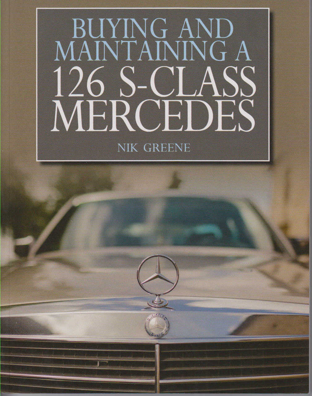 Automotive guide book cover with Mercedes logo and title lettering