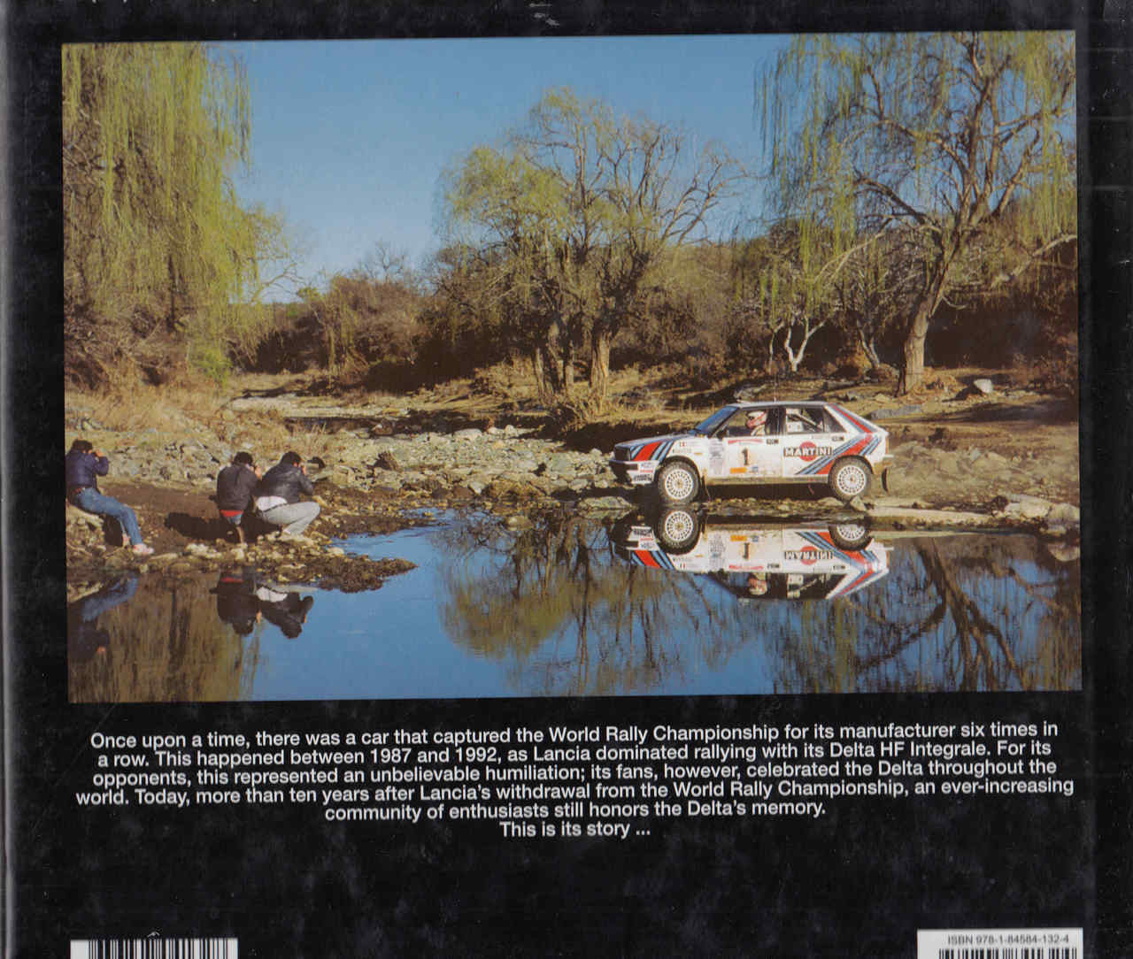 Racing book back cover with white rally car reflected in water