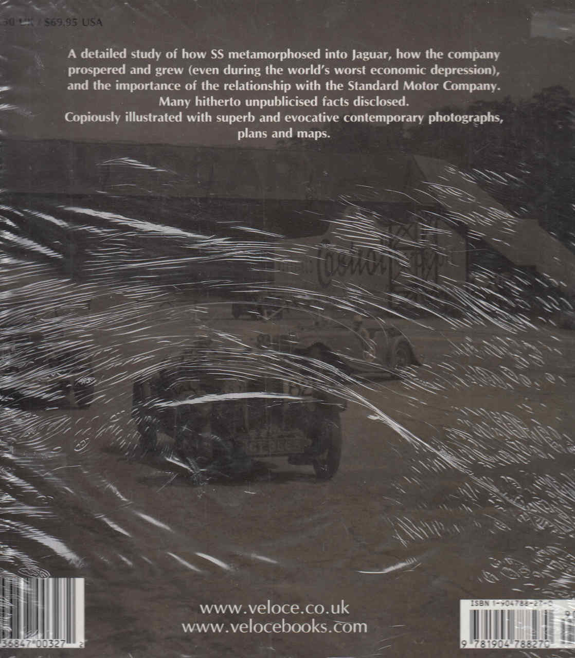 Jaguar era study book with black cover and car photo collage