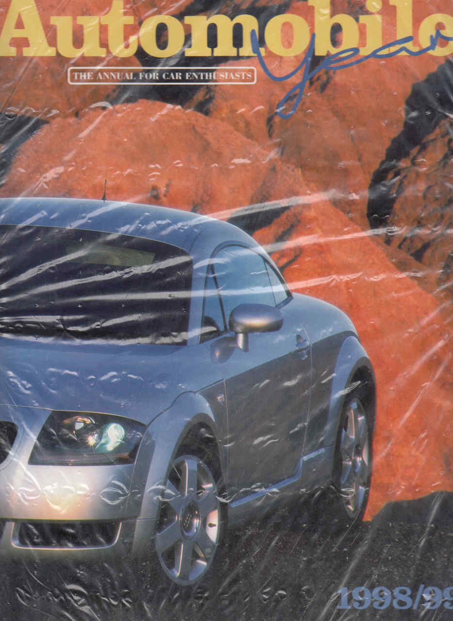 1998-1999 automobile print, dark blue sports car front three-quarter view