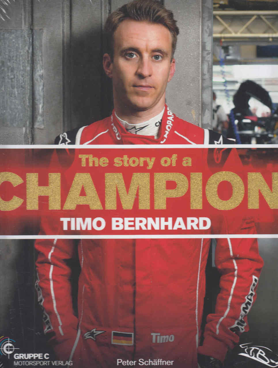 Racing champion story book, red cover with portrait and bold title