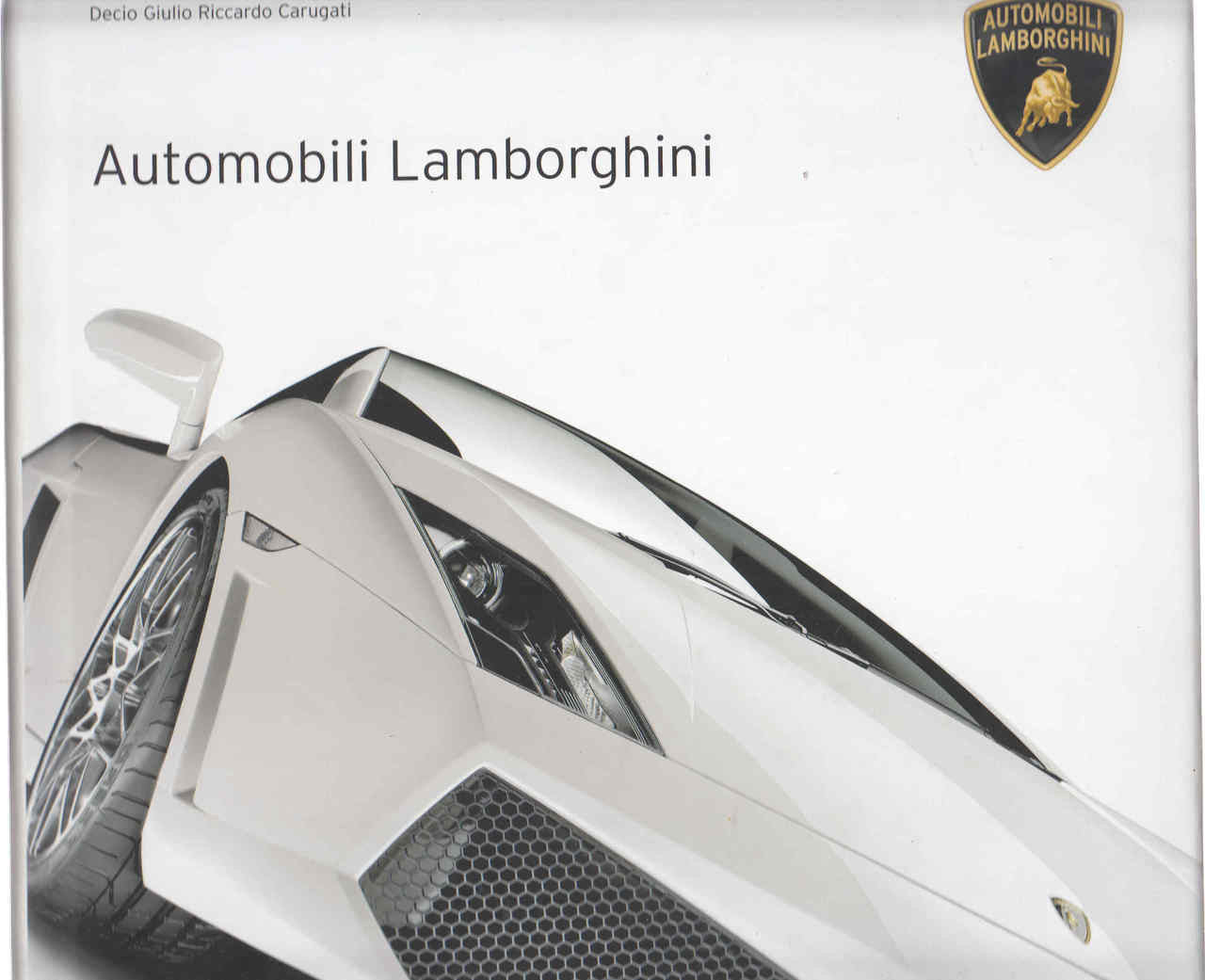 Automobili Lamborghini book cover featuring a silver sports car front view
