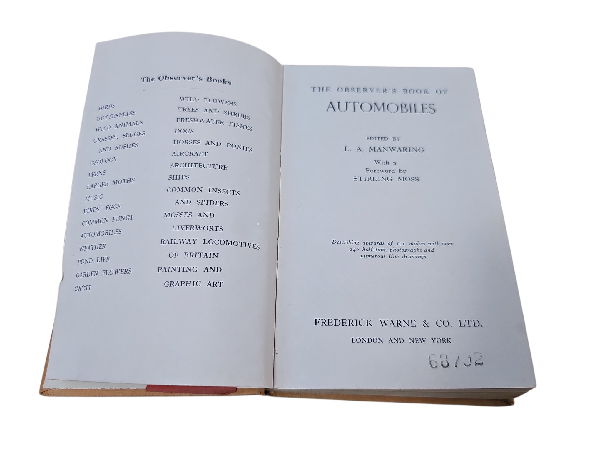Open automobiles book showing table of contents and title page text