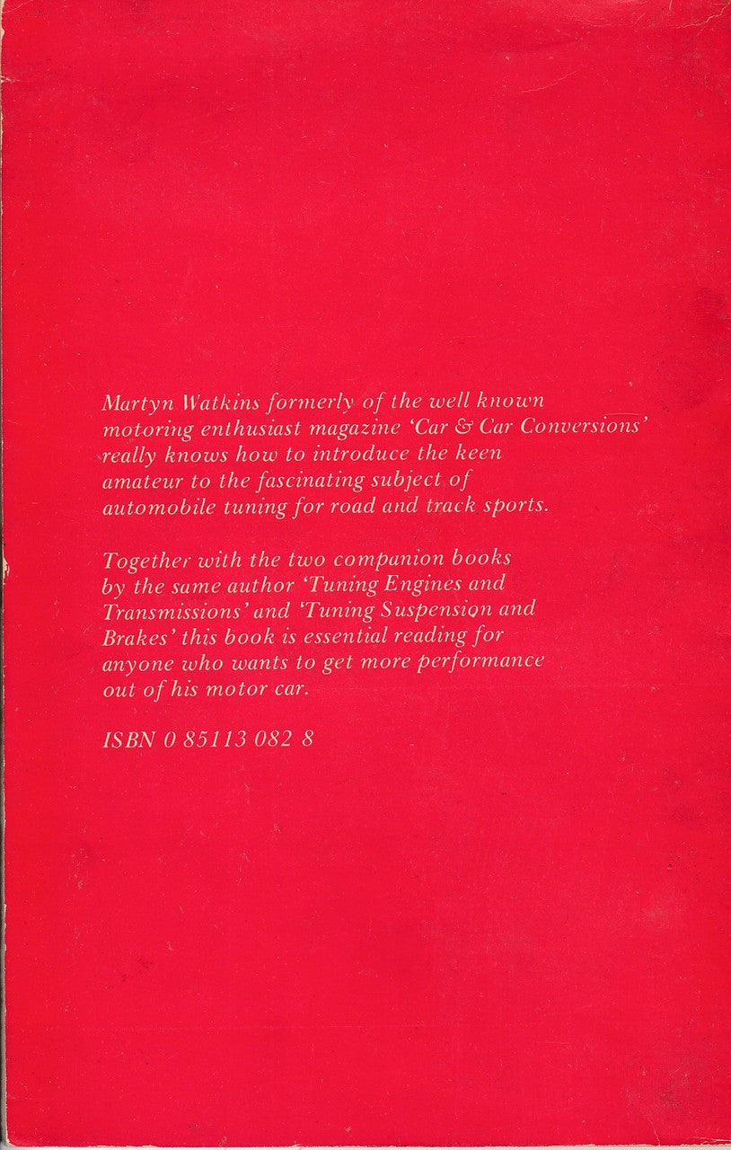 Book back cover with red fabric-like design and small white text