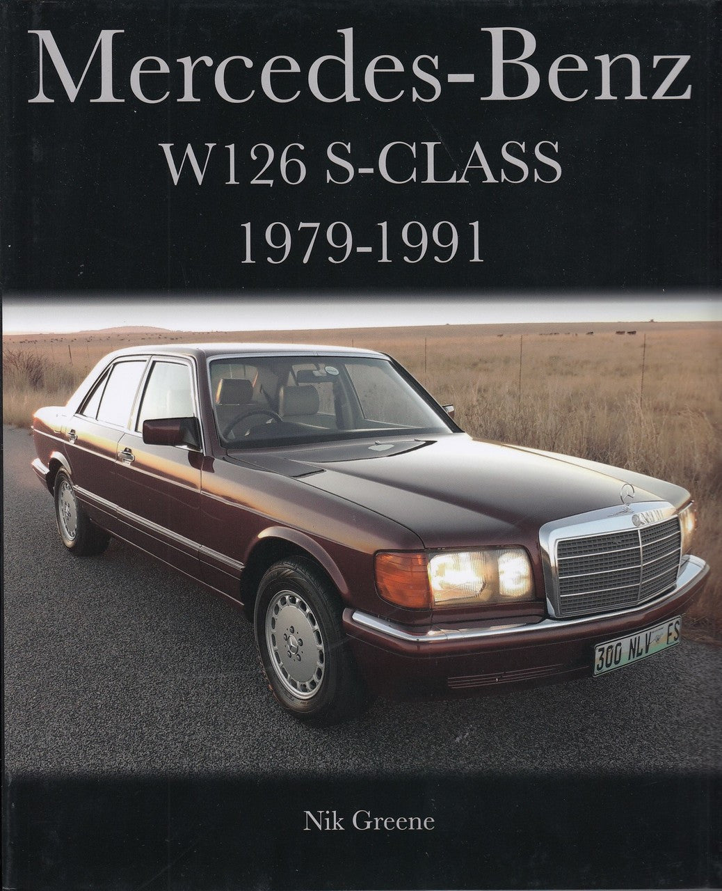Mercedes-Benz W126 S-Class 1979-1991 book cover with dark sedan front view