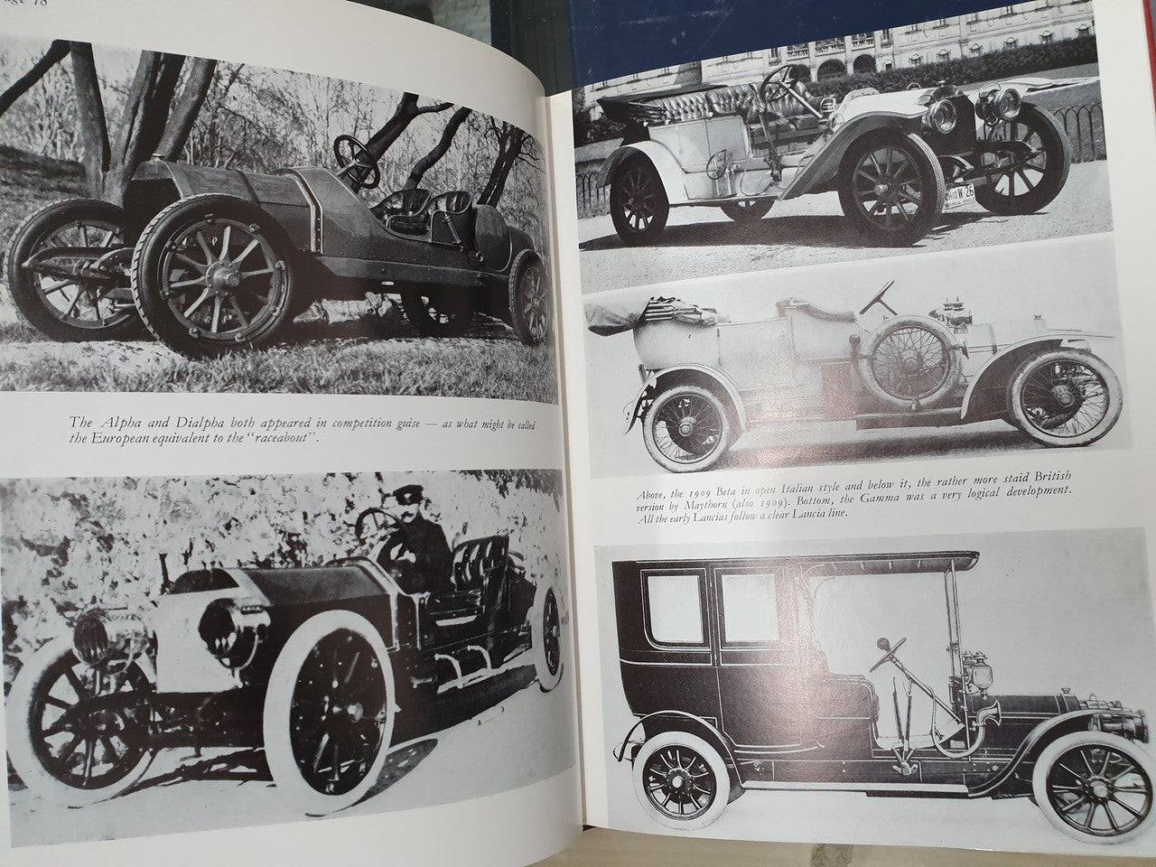 Vintage racing book spread with black-and-white vintage car illustrations